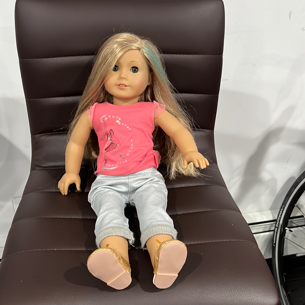 American Girl Doll with Pink Shirt and Gold Shoes